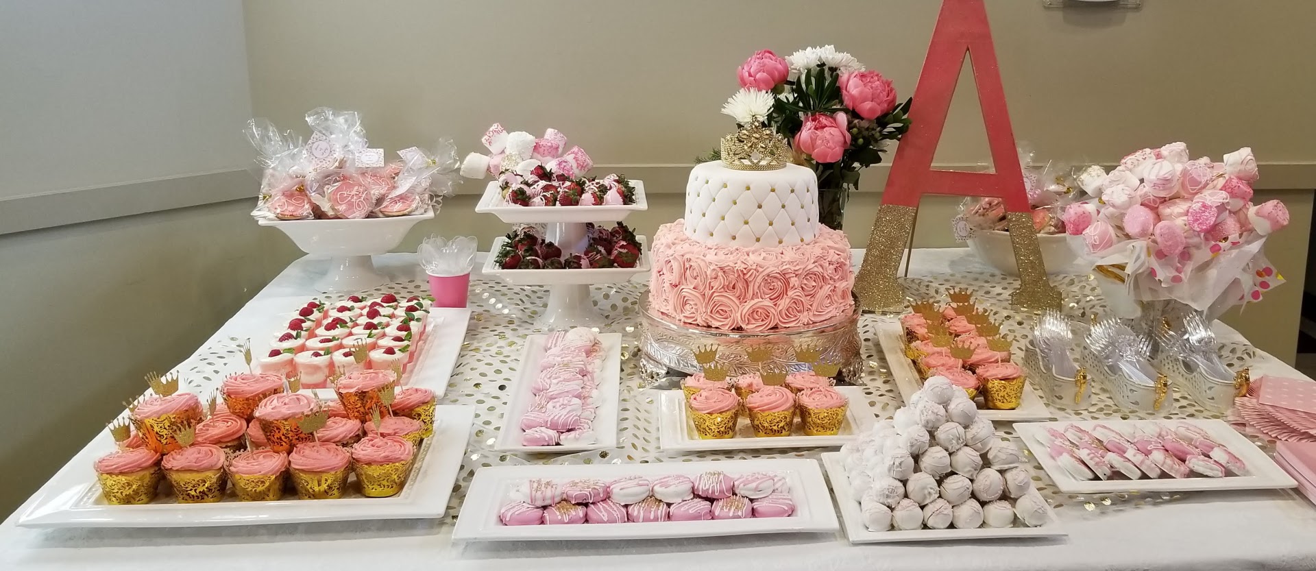 Sweet 16 Birthday A Table Topped with Treats