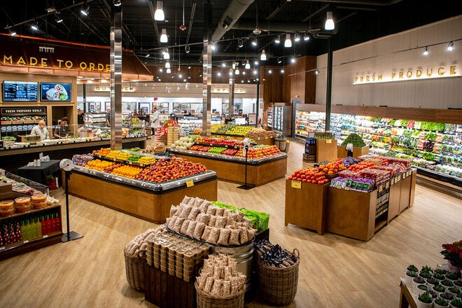 a grocery store with lots of produce - Birthday Cakes Near Me